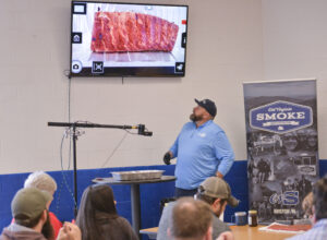 BBQ world champion demonstrates cooking techniques at MHS fundraiser